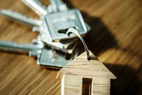 A pair of keys laying on a table